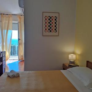 Postel nebo postele na pokoji v ubytování Piccolo Hotel Nuova gestione