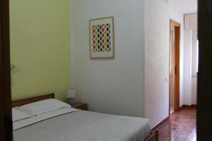 Postel nebo postele na pokoji v ubytování Piccolo Hotel Nuova gestione