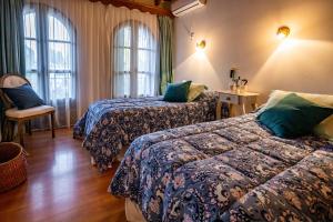 Cama ou camas em um quarto em Casona La Chiquita