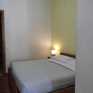 Postel nebo postele na pokoji v ubytování Piccolo Hotel Nuova gestione