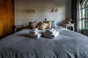 Cama ou camas em um quarto em Casona La Chiquita