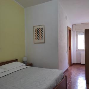 Postel nebo postele na pokoji v ubytování Piccolo Hotel Nuova gestione