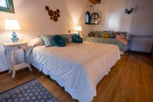 Cama ou camas em um quarto em Casona La Chiquita