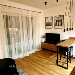 TV a/nebo společenská místnost v ubytování Apartament Studio