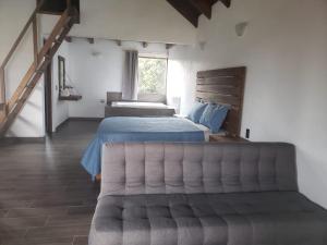 Postel nebo postele na pokoji v ubytování Cabaña Erendy2