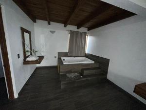 Postel nebo postele na pokoji v ubytování Cabaña Erendy2
