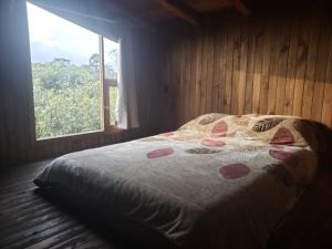 Postel nebo postele na pokoji v ubytování Cabaña Erendy2