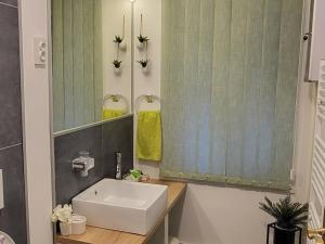 Koupelna v ubytování Rooms BAUMAN