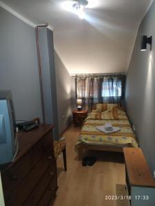 Postel nebo postele na pokoji v ubytování Kneževi konaci