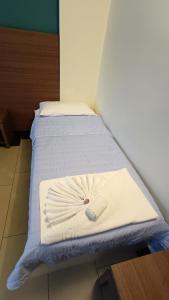 Postel nebo postele na pokoji v ubytování Hotel Don Giovanni