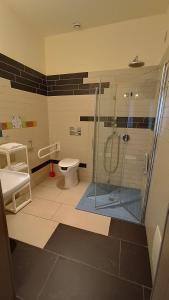 Koupelna v ubytování Hotel Don Giovanni