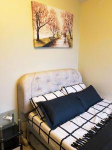 Ένα ή περισσότερα κρεβάτια σε δωμάτιο στο Horizon 101 CCLX Sea View Unit 47F