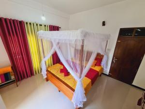 Letto o letti in una camera di Jungle Lodge