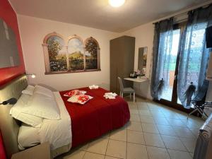 A bed or beds in a room at Il Casale Della Fornace