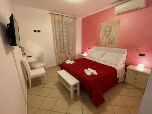 A bed or beds in a room at Il Casale Della Fornace
