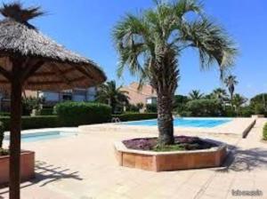 Bazén v ubytovaní Appartement 4 personnes, Piscine, Parking à Palavas les flots alebo v jeho blízkosti