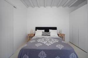 Кровать или кровати в номере Blue Sea Villa
