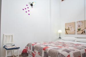 Siracusa Casa Tiche & Selene客房内的一张或多张床位