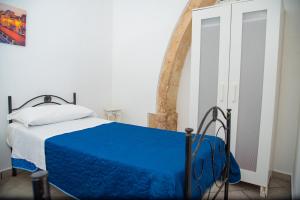 Siracusa Casa Tiche & Selene客房内的一张或多张床位