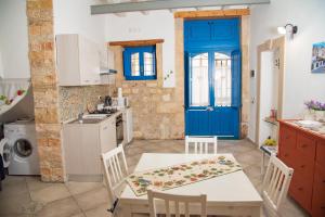 Siracusa Casa Tiche & Selene的厨房或小厨房