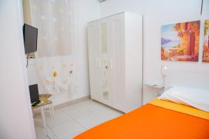 A bed or beds in a room at Casa Vacanze Nike