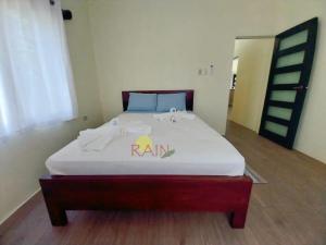 Ένα ή περισσότερα κρεβάτια σε δωμάτιο στο Highend resort