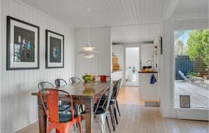 a kitchen and dining room with a table and chairs at Stunning Home In Hillerd With Jacuzzi, Wifi And 3 Bedrooms in Hillerød