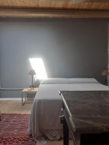 Ένα ή περισσότερα κρεβάτια σε δωμάτιο στο Domus 31