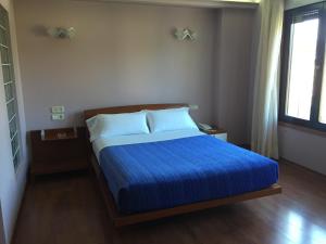 Postel nebo postele na pokoji v ubytování Motel Abalo
