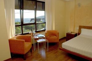 Postel nebo postele na pokoji v ubytování Motel Abalo