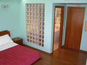 Postel nebo postele na pokoji v ubytování Motel Abalo