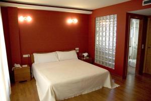 Postel nebo postele na pokoji v ubytování Motel Abalo