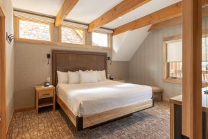 Voodi või voodid majutusasutuse Moose Hotel and Suites toas