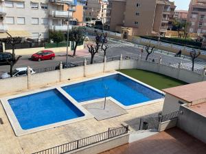 Bazén v ubytování Apartamento Canet d’en Berenguer nebo v jeho okolí