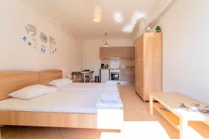 Kuchyň nebo kuchyňský kout v ubytování Veta Apartment - Beachside