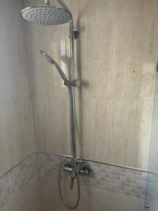 a shower with a glass door in a bathroom at Bellomar I Exclusive Juan Dolio Playa Hemingway in Juan Dolio