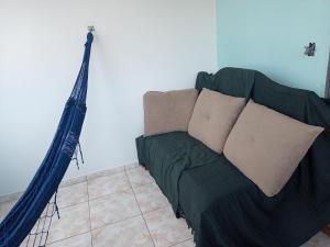 Et opholdsområde på Acomodação Pai eterno