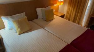 Cama ou camas em um quarto em Hotel Jose Alberto