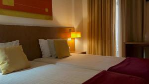 Cama ou camas em um quarto em Hotel Jose Alberto
