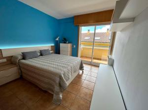 Postel nebo postele na pokoji v ubytování Apartamento Portosin con piscina al lado de la playa