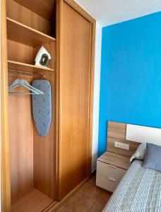 Postel nebo postele na pokoji v ubytování Apartamento Portosin con piscina al lado de la playa