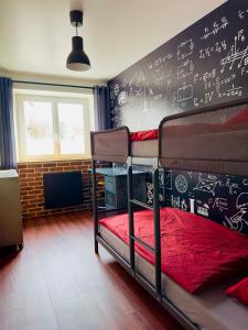 Ένα ή περισσότερα κρεβάτια σε δωμάτιο στο Appartement familial Disneyland Paris - wifi et parking inclus ! +9 φωτογραφίες