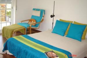Ένα ή περισσότερα κρεβάτια σε δωμάτιο στο Casa do Rio
