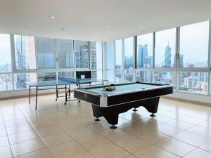 a room with two ping pong tables in a building at Apartamento Boutique en Avenida Balboa in Panama City