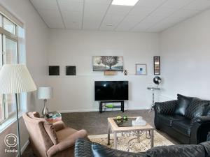 Posezení v ubytování 1 bedroom lake Mountain view