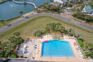 an overhead view of a swimming pool at a resort at Pelican Beach Terrace 805 in Destin
