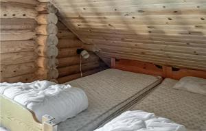 Gulta vai gultas numurā naktsmītnē Cozy Home In Slen With Sauna