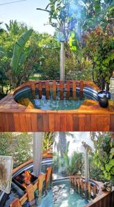 uma piscina com uma mesa com uma piscina em Santika Getaway Cottage Stellenbosch em Stellenbosch