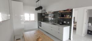 Køkken eller tekøkken på Casa da paz #2 + 9 billeder