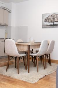 Kuchyň nebo kuchyňský kout v ubytování Millennium Apartment + 35 fotografií